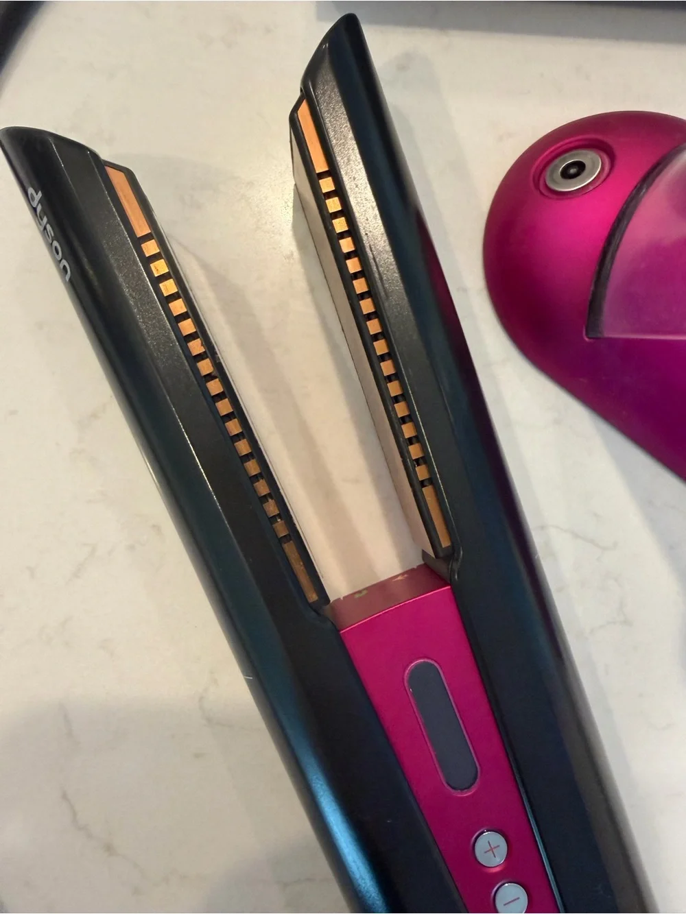 Dyson hair straightener in black and pink